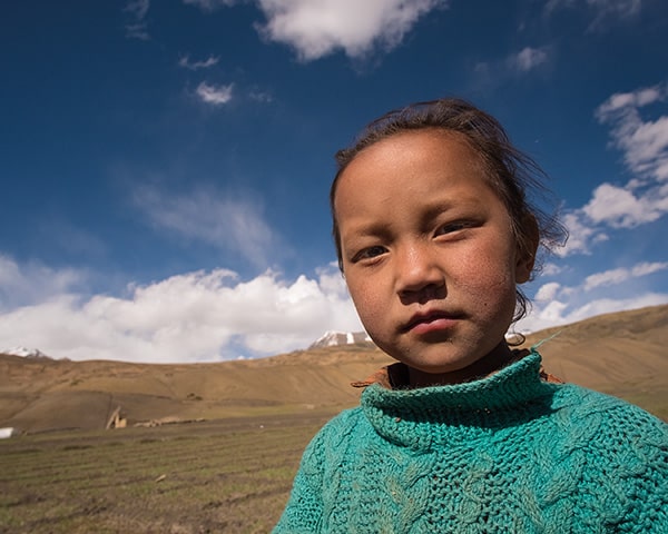 Young villager in the Himalayan plateaus of Spiti Valley. Himachal Pradesh, India.